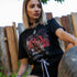 Frau in nocturnal Astronaut regular T-Shirt in schwarz in unisex
